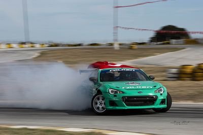Abbas Çimen's Subaru BRZ pairs the Japanese platform's razor-sharp chassis with one of Türkiye's most thoroughly engineered drift builds. In place of the factory boxer sits a 2JZ-VVTI, fed by a Garrett GTX 3076 turbocharger that lifts output to 410 horsepower in line with the legendary Toyota block's reputation. The driveline is built on the same philosophy: power leaves a BMW 525 gearbox, passes through a Lexus 410 differential, and reaches the tarmac without a wasted moment. A Wisefab angle kit takes the BRZ's geometry well beyond what any road-going coupe was ever meant to do, while Cusco sway bars and Wilwood callipers keep the car planted on the limit through every transition. The Rocketbunny widebody draws an instantly recognisable silhouette on track, and the APR rear wing rounds out the aerodynamics package. Inside, a Link Extreme ECU and Link dash convert the cockpit into a full race laboratory, with Sparco seat, harness, fire suppression, and roll cage forming a complete safety envelope. This BRZ is not just a car. It is a statement of intent on the grid.